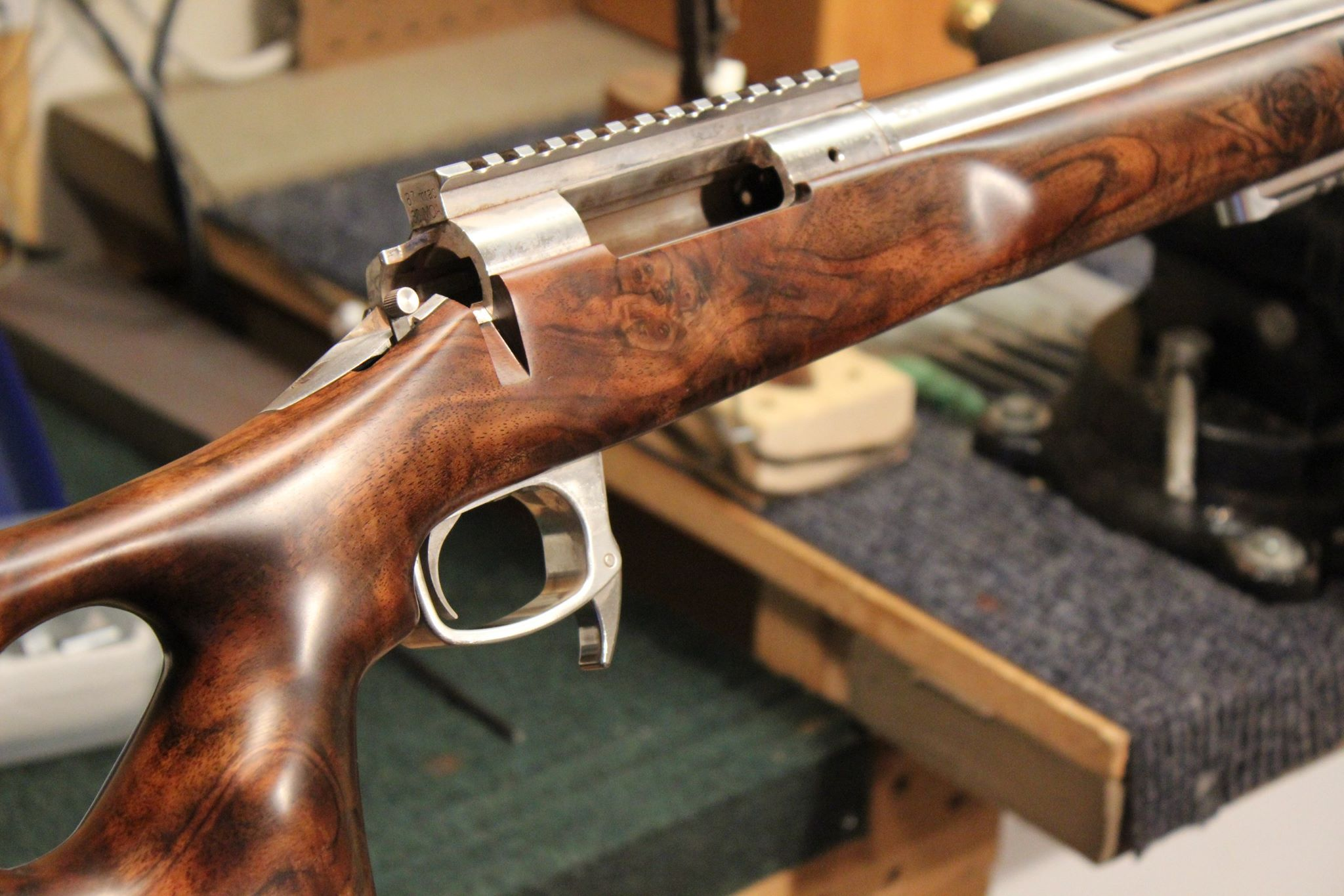 Finished walnut rifle stock close-up
